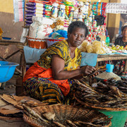 A trader with goods at a market